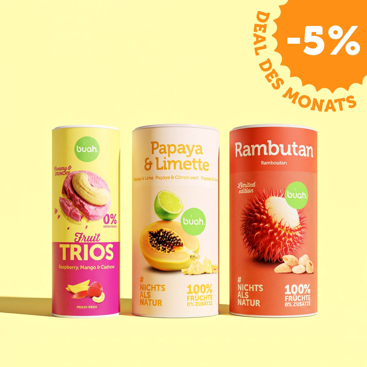 Drei buah-Dosen mit gefriergetrockneten Früchten: „Fruit TRIOS“ mit Himbeere, Mango und Cashew, „Papaya & Limette“ und „Rambutan“; „DEAL DES MONATS“, „-5 %“ Rabatt.